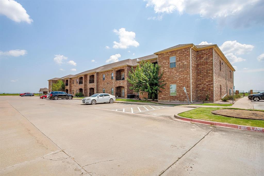 301 County Road 207, Unit 1110 Alvarado, TX 76009 - Photo 5 of 25 a view of pool with outdoor seating