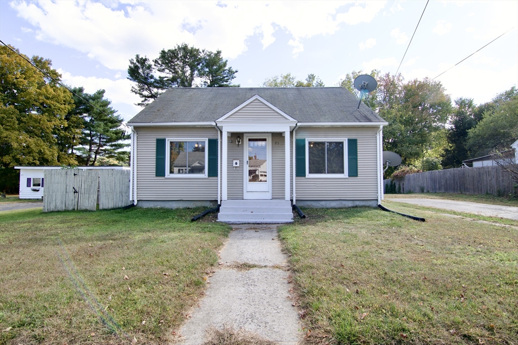 25 Chudy Street Three Rivers, MA 01080 - Photo 1 of 42 a front view of a house with garden