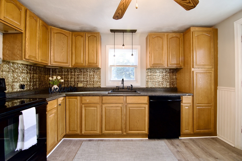 25 Chudy Street Three Rivers, MA 01080 - Photo 15 of 42 a kitchen with stainless steel appliances granite countertop a refrigerator and a sink