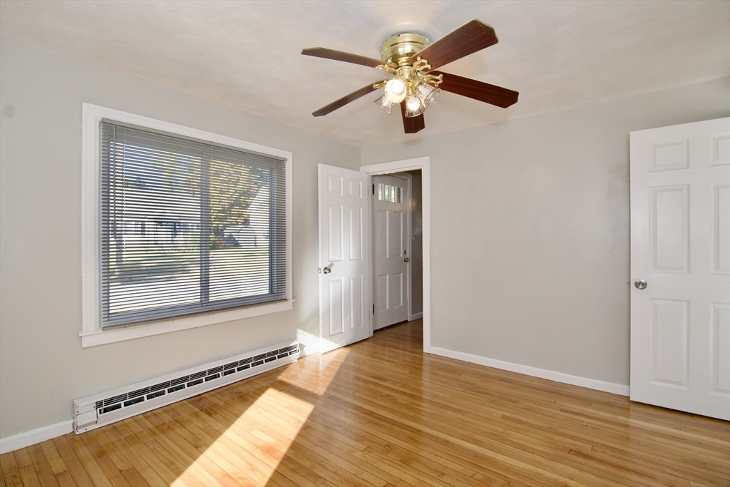 25 Chudy Street Three Rivers, MA 01080 - Photo 20 of 42 a view of an empty room with wooden floor and a window