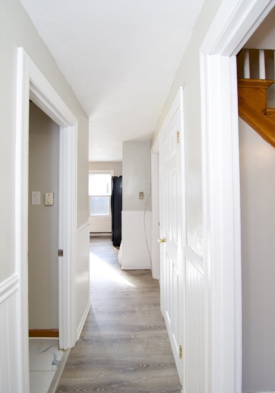 25 Chudy Street Three Rivers, MA 01080 - Photo 24 of 42 a view of a hallway with wooden floor and entryway