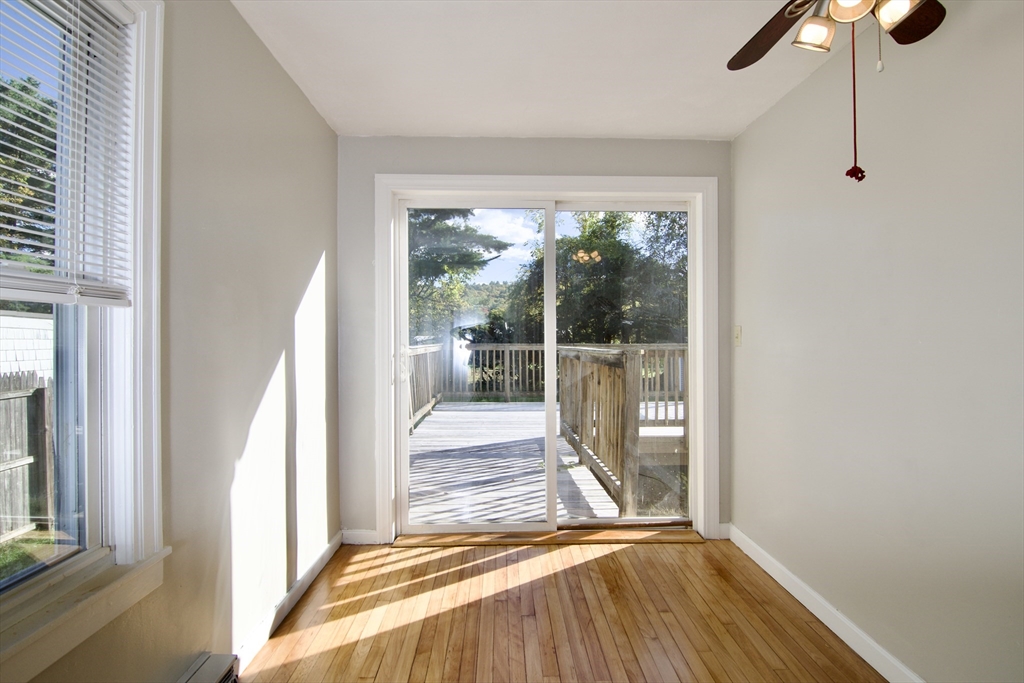 25 Chudy Street Three Rivers, MA 01080 - Photo 26 of 42 a view of a room with wooden floor and windows