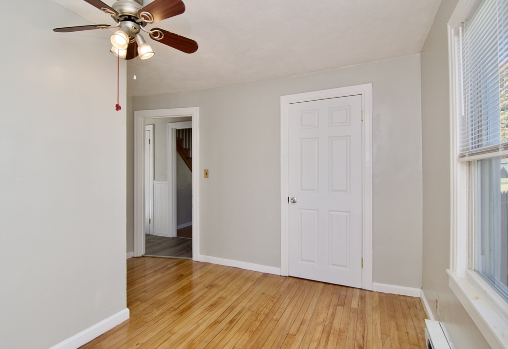 25 Chudy Street Three Rivers, MA 01080 - Photo 28 of 42 a view of an empty room and wooden floor