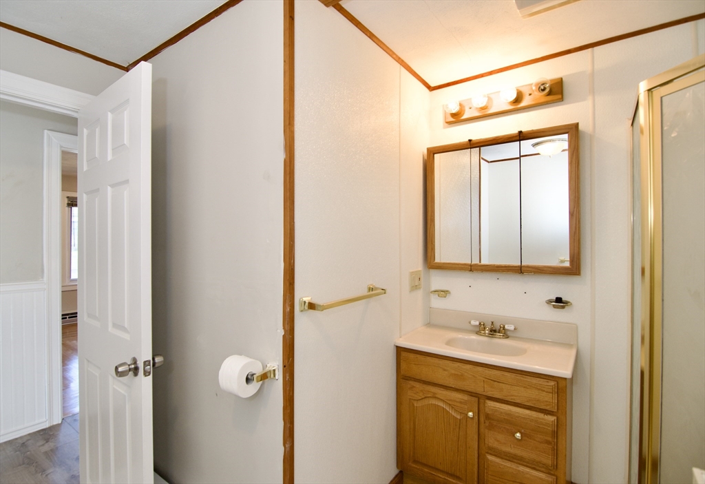 25 Chudy Street Three Rivers, MA 01080 - Photo 30 of 42 a bathroom with a sink and a mirror