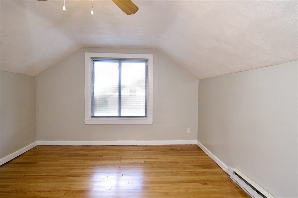 25 Chudy Street Three Rivers, MA 01080 - Photo 31 of 42 a view of empty room with wooden floor and fan