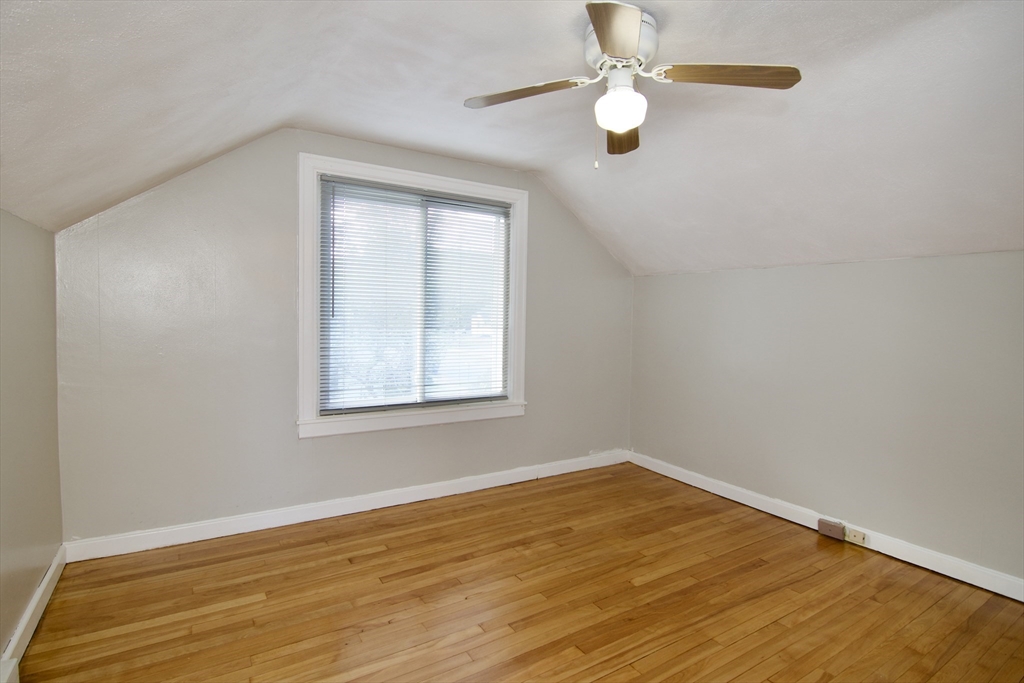 25 Chudy Street Three Rivers, MA 01080 - Photo 36 of 42 a view of empty room with wooden floor and fan