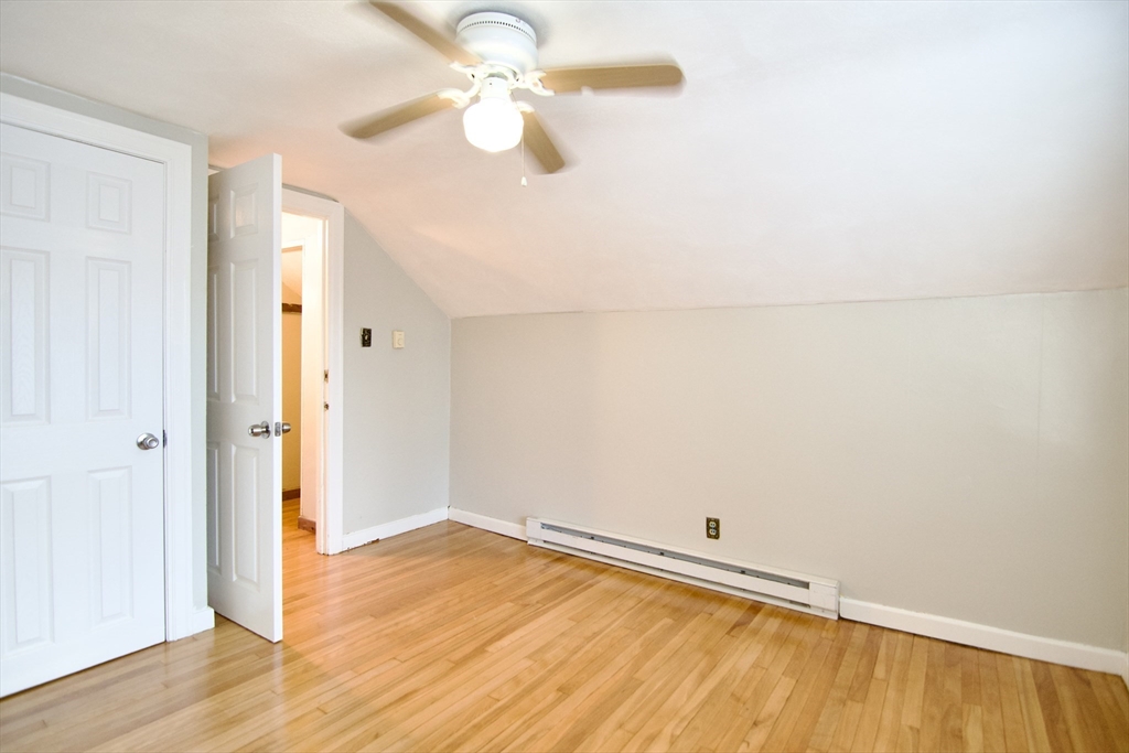 25 Chudy Street Three Rivers, MA 01080 - Photo 39 of 42 a view of a room with wooden floor and a ceiling fan