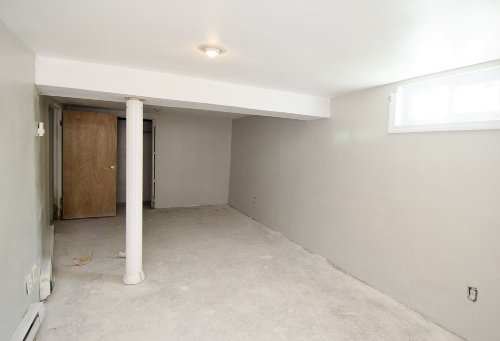 25 Chudy Street Three Rivers, MA 01080 - Photo 41 of 42 an empty room with windows