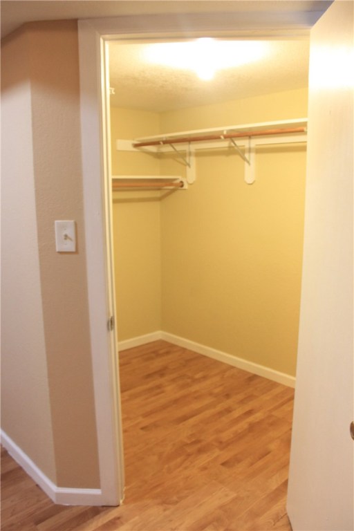 6 Fairview Drive Round Rock, TX 78665 - Photo 6 of 12 a view of a room with wooden floor