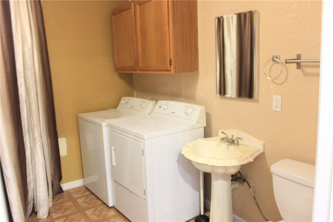 6 Fairview Drive Round Rock, TX 78665 - Photo 10 of 12 a bathroom with a sink and a mirror