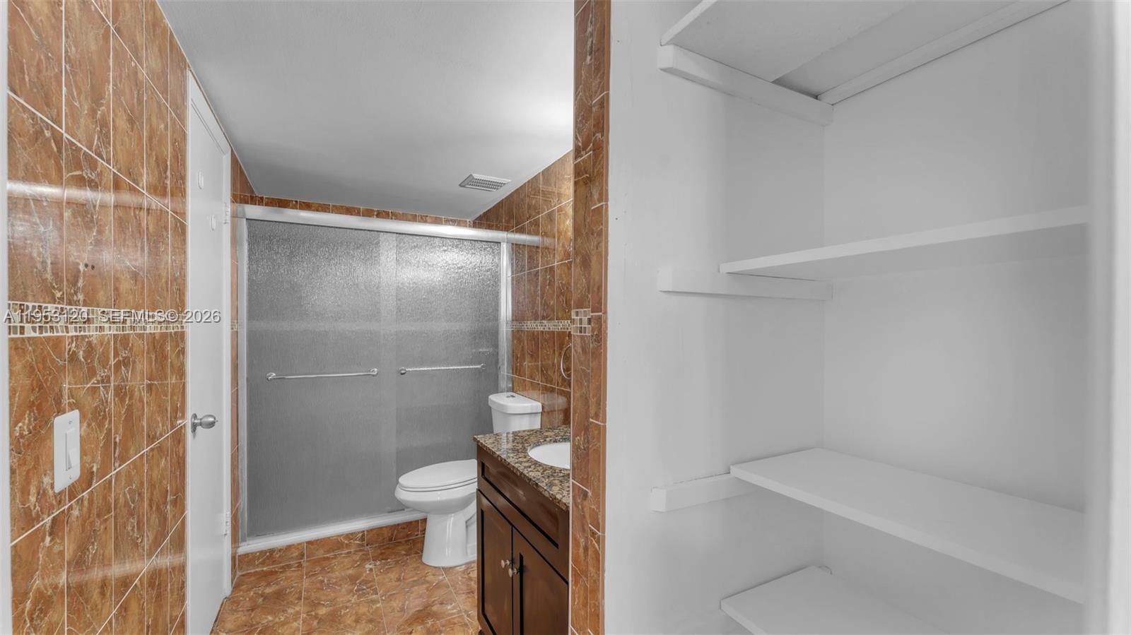 2780 West 76th Street, Unit 203 Hialeah, FL 33016 - Photo 13 of 21 a bathroom with a shower and a toilet