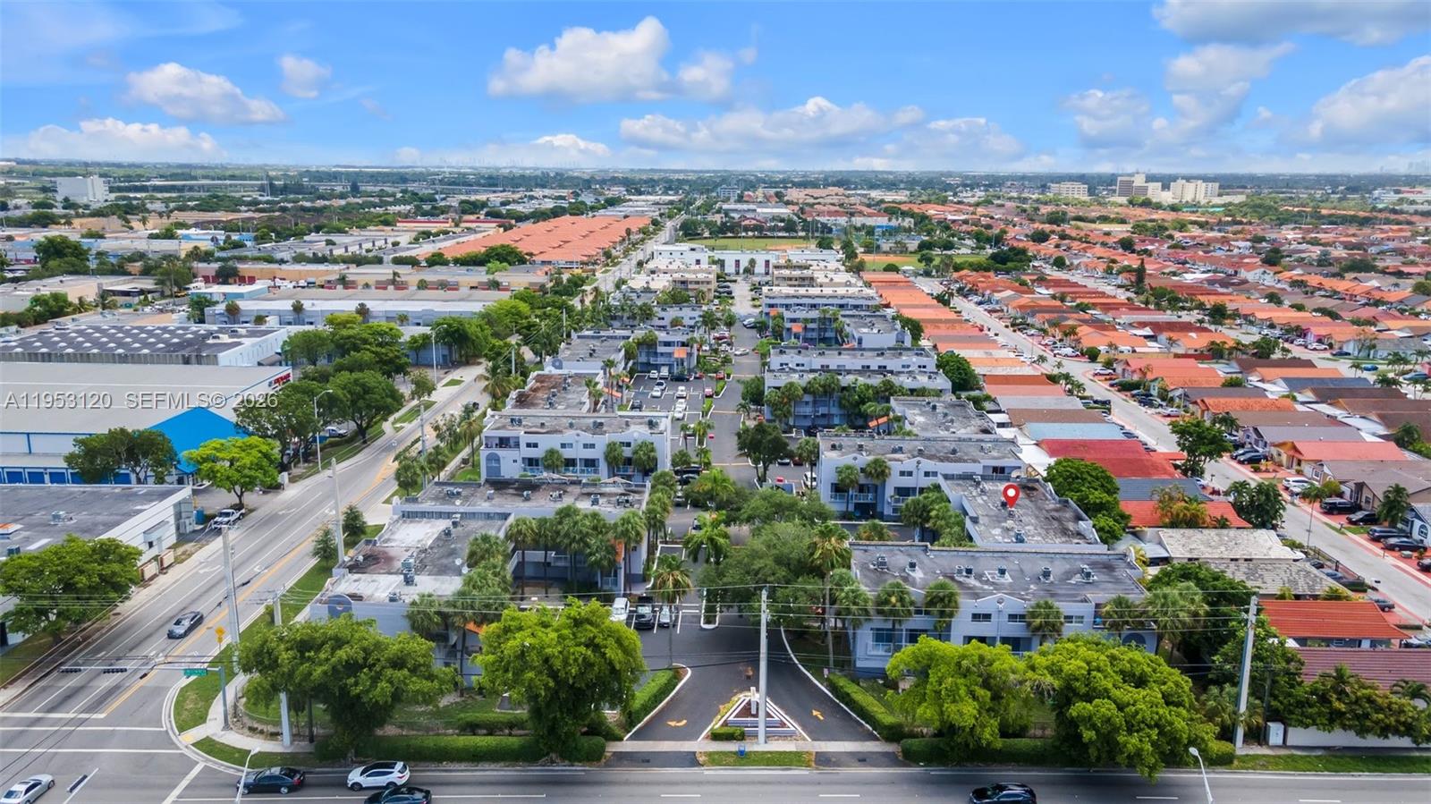 2780 West 76th Street, Unit 203 Hialeah, FL 33016 - Photo 2 of 21 an aerial view of residential houses with outdoor space and ocean view