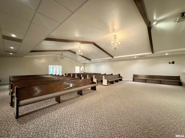 a living room with furniture and a couch