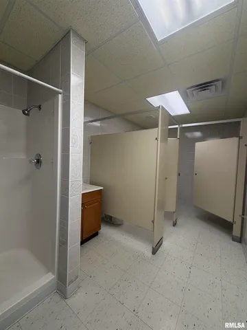 a workspace with furniture and a window