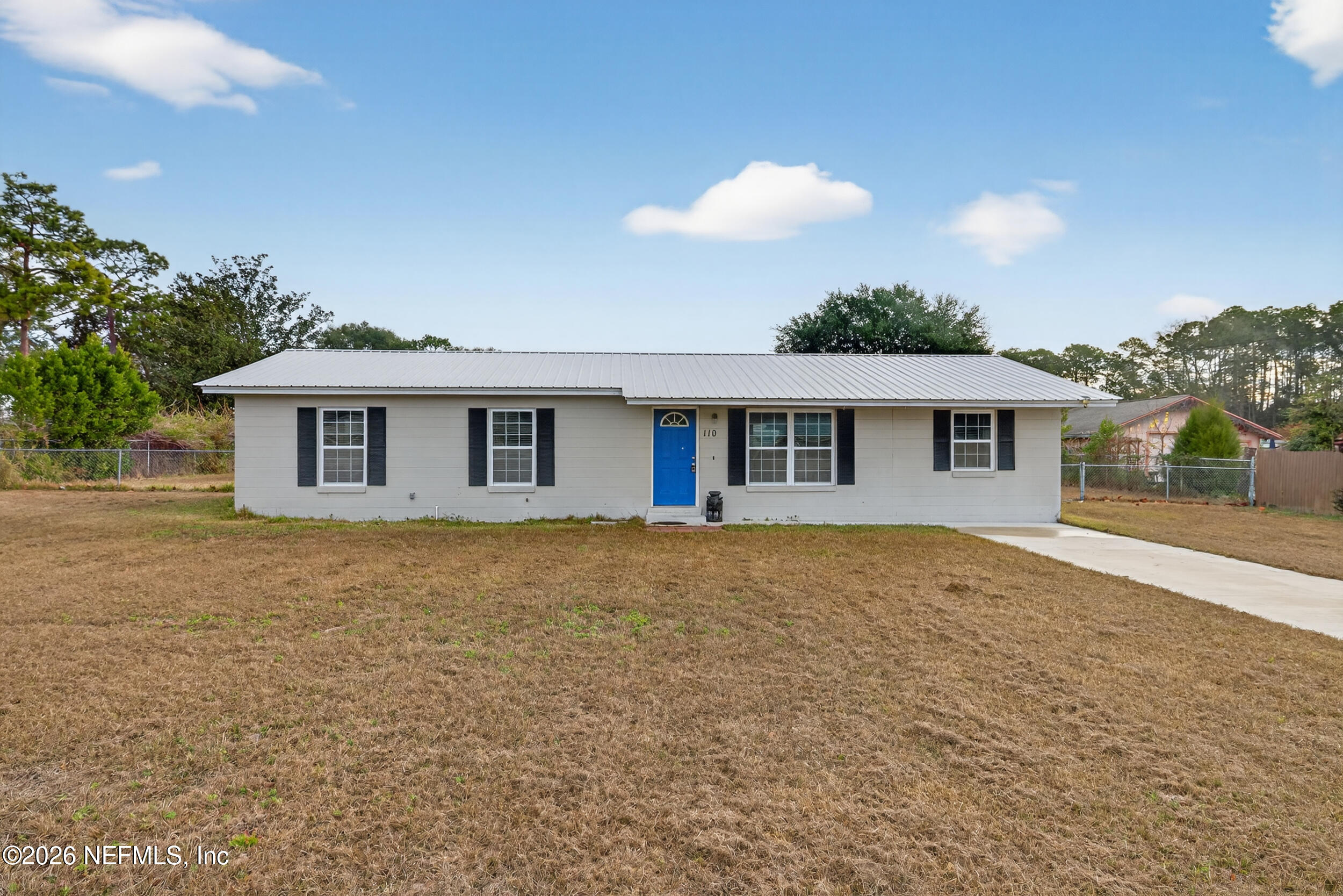 110 East Rellim Drive Palatka, FL 32177 - Photo 2 of 29 a view of a house with a backyard