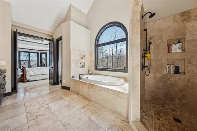 a living room with furniture wooden floor and a flat screen tv