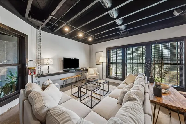 a view of a chairs and table in the patio