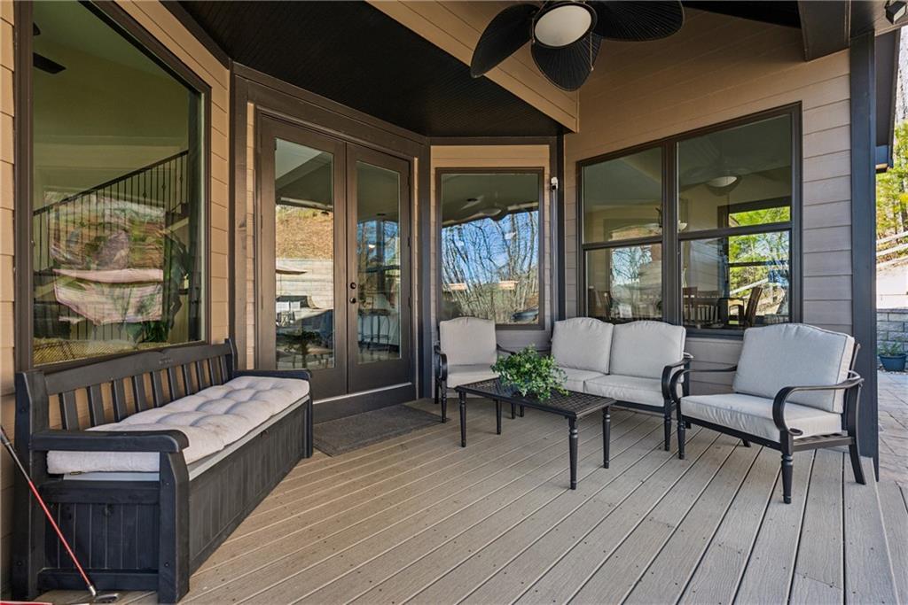 101 Bevil Ridge Road Southeast Emerson, GA 30137 - Photo 54 of 74 a balcony with furniture and wooden floor