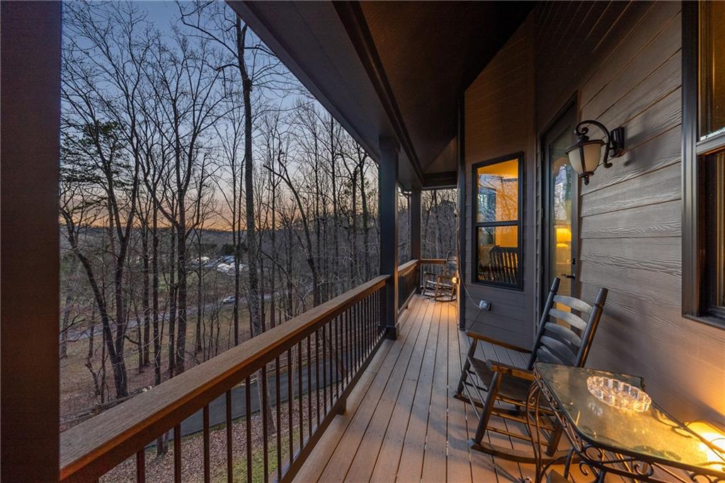 101 Bevil Ridge Road Southeast Emerson, GA 30137 - Photo 65 of 74 a view of balcony with wooden floor and seating space