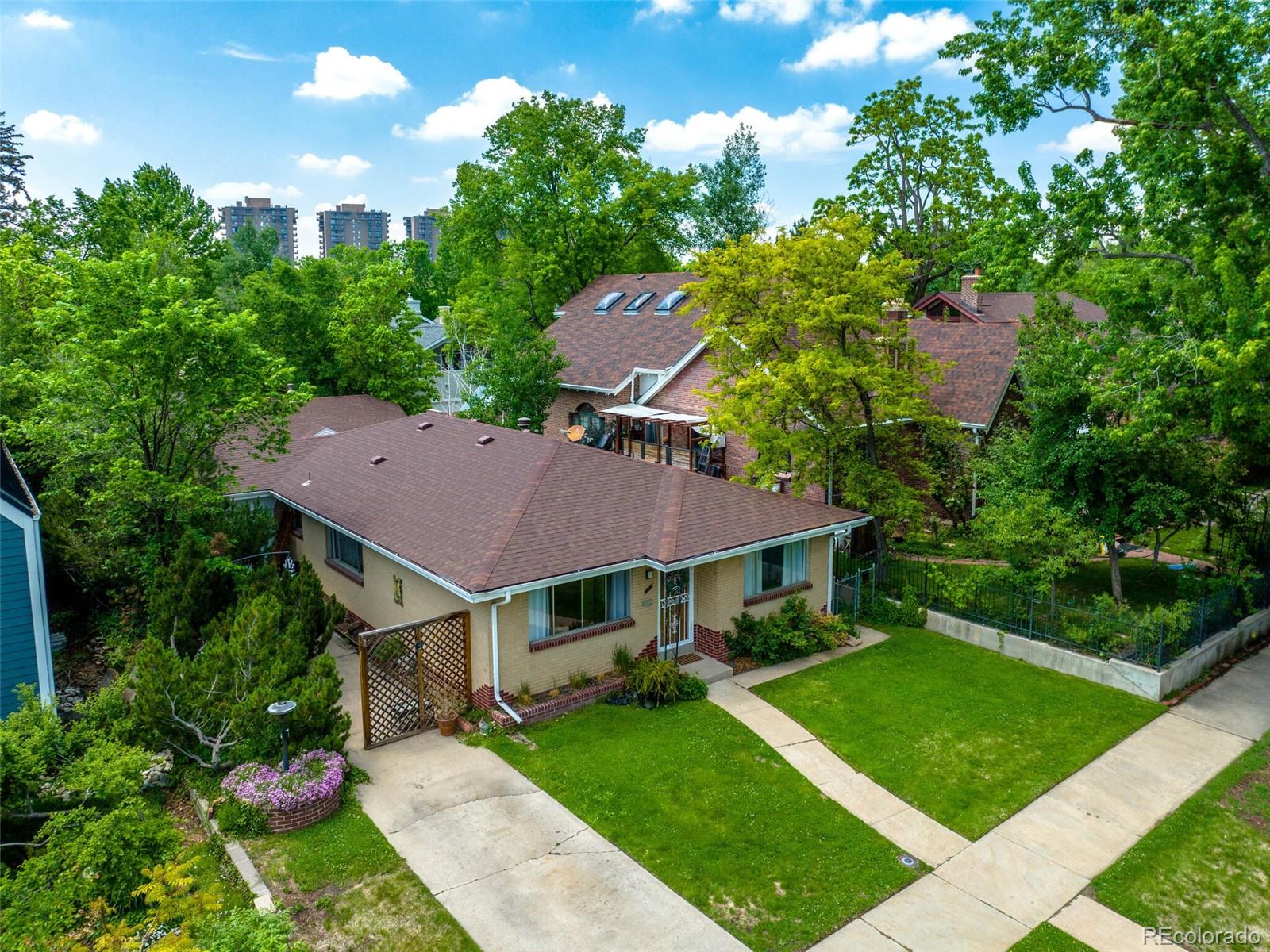 547 South Williams Street Denver, CO 80209 - Photo 14 of 18 a view of a house with a yard