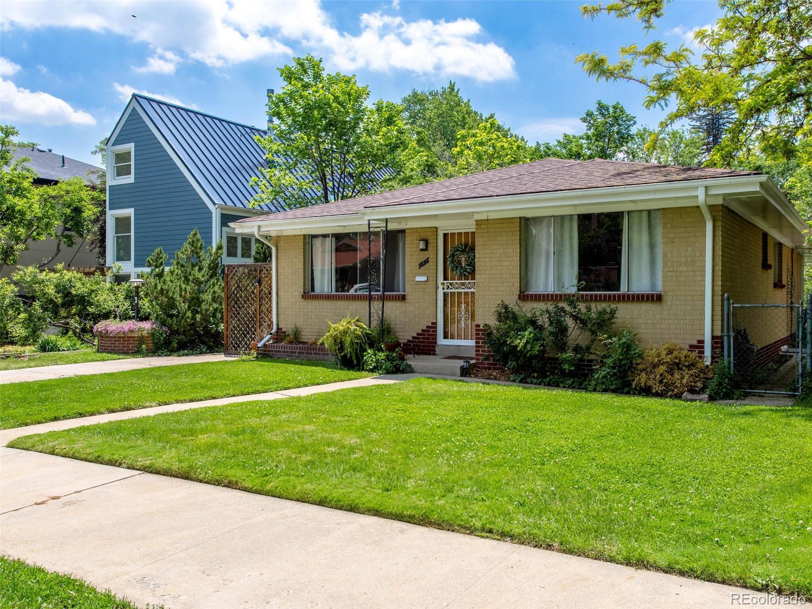 547 South Williams Street Denver, CO 80209 - Photo 4 of 18 front view of a house with a yard