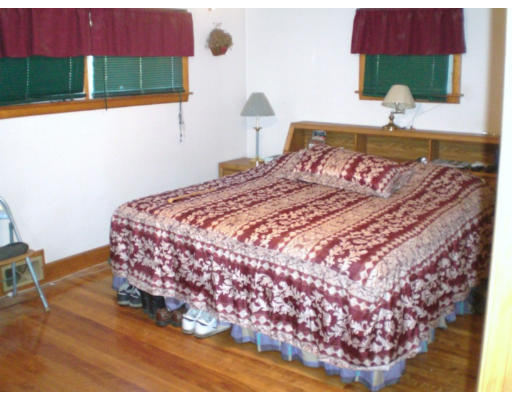 108 S Road Templeton, MA 01468 - Photo 13 of 18 a bedroom with a bed and a painting on the wall
