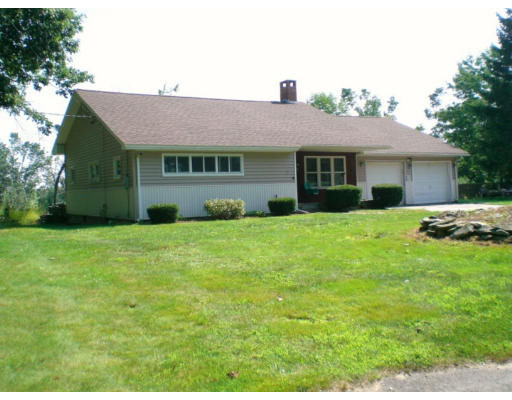 108 S Road Templeton, MA 01468 - Photo 2 of 18 a front view of a house with garden