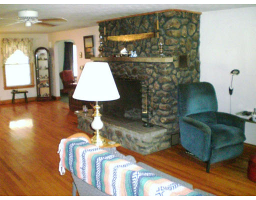 108 S Road Templeton, MA 01468 - Photo 10 of 18 a living room with furniture and a fireplace