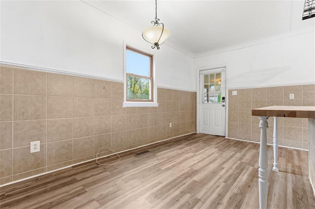 4111 Wildcat Road New Kensington, PA 15068 - Photo 18 of 48 a view of a room with wooden floor and windows