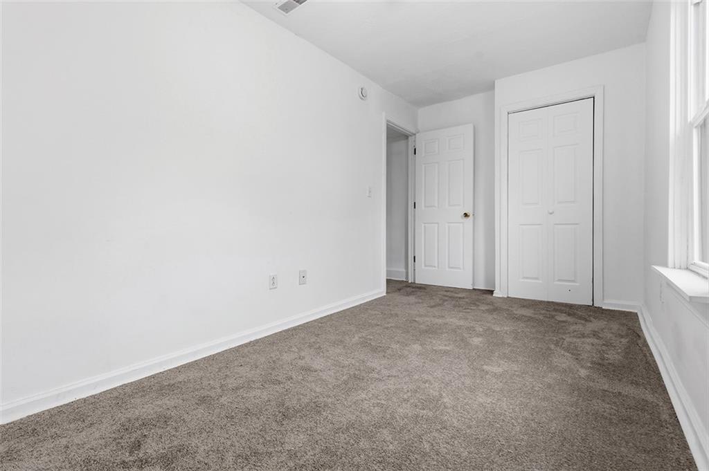 4111 Wildcat Road New Kensington, PA 15068 - Photo 26 of 48 a view of an empty room and a window