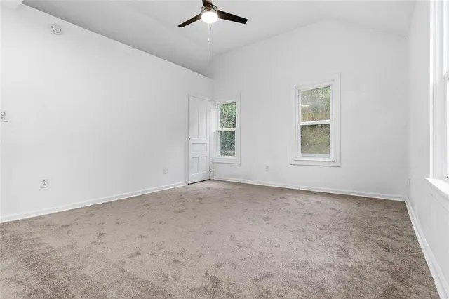 an empty room with windows