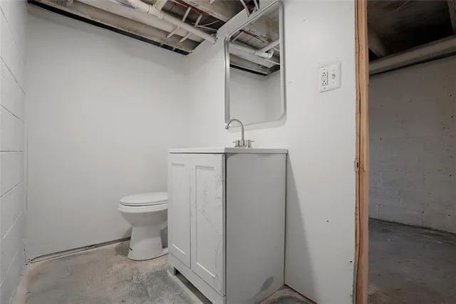 a view of a house with a barbeque