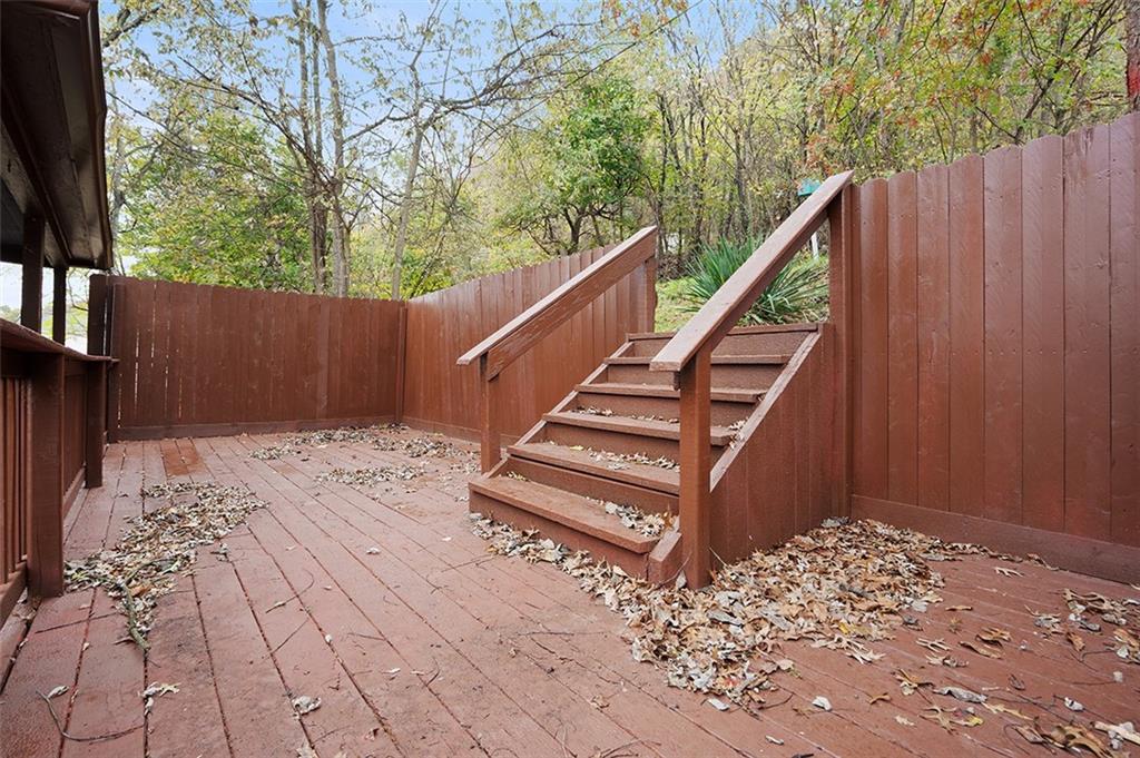 4111 Wildcat Road New Kensington, PA 15068 - Photo 36 of 48 a view of a backyard with wooden fence and trees