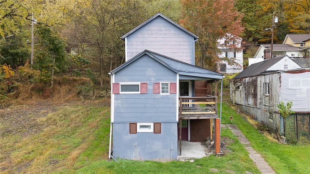 4111 Wildcat Road New Kensington, PA 15068 - Photo 44 of 48 a front view of a house with a yard