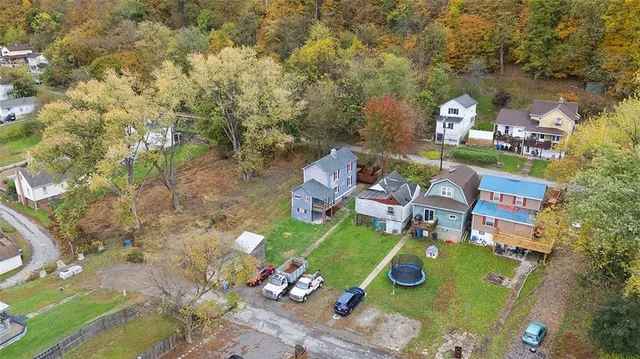 view of a wooden deck and garden
