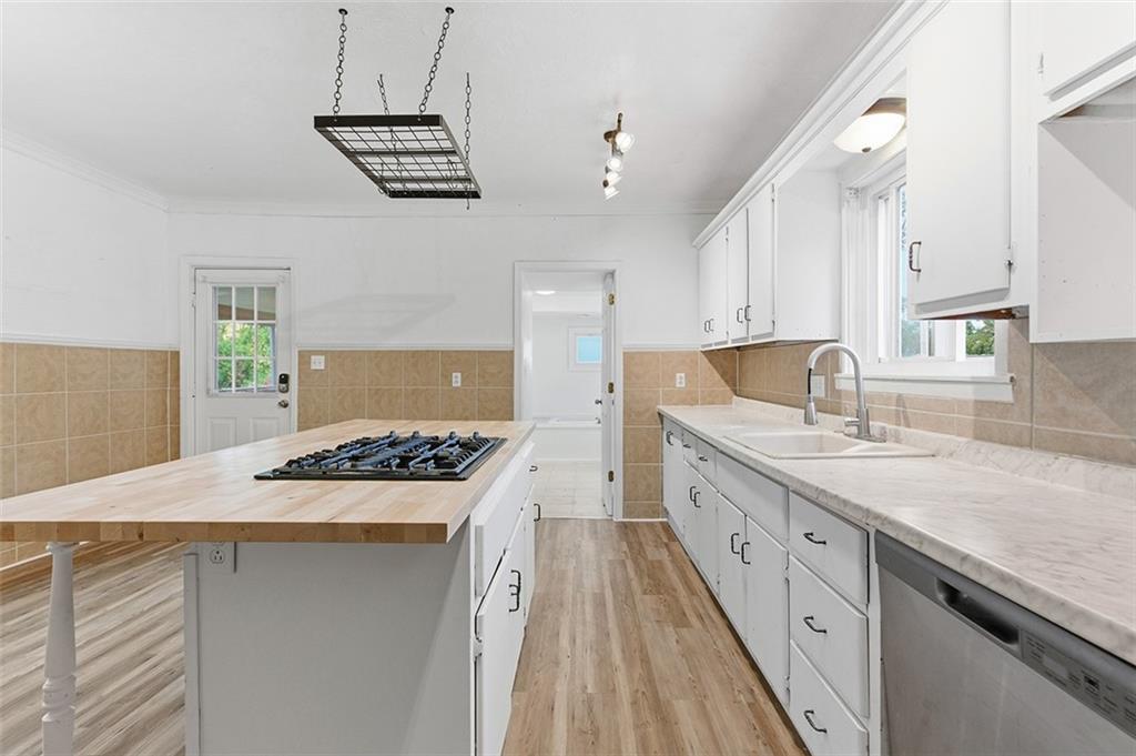 4111 Wildcat Road New Kensington, PA 15068 - Photo 6 of 48 a kitchen with stainless steel appliances granite countertop a sink stove and refrigerator