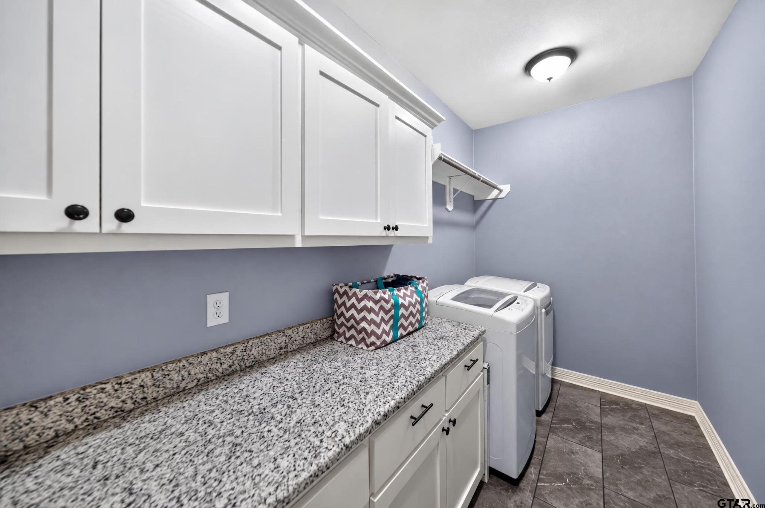 4008 Chapel Ridge Tyler, TX 75707 - Photo 14 of 34 Storage in laundry room