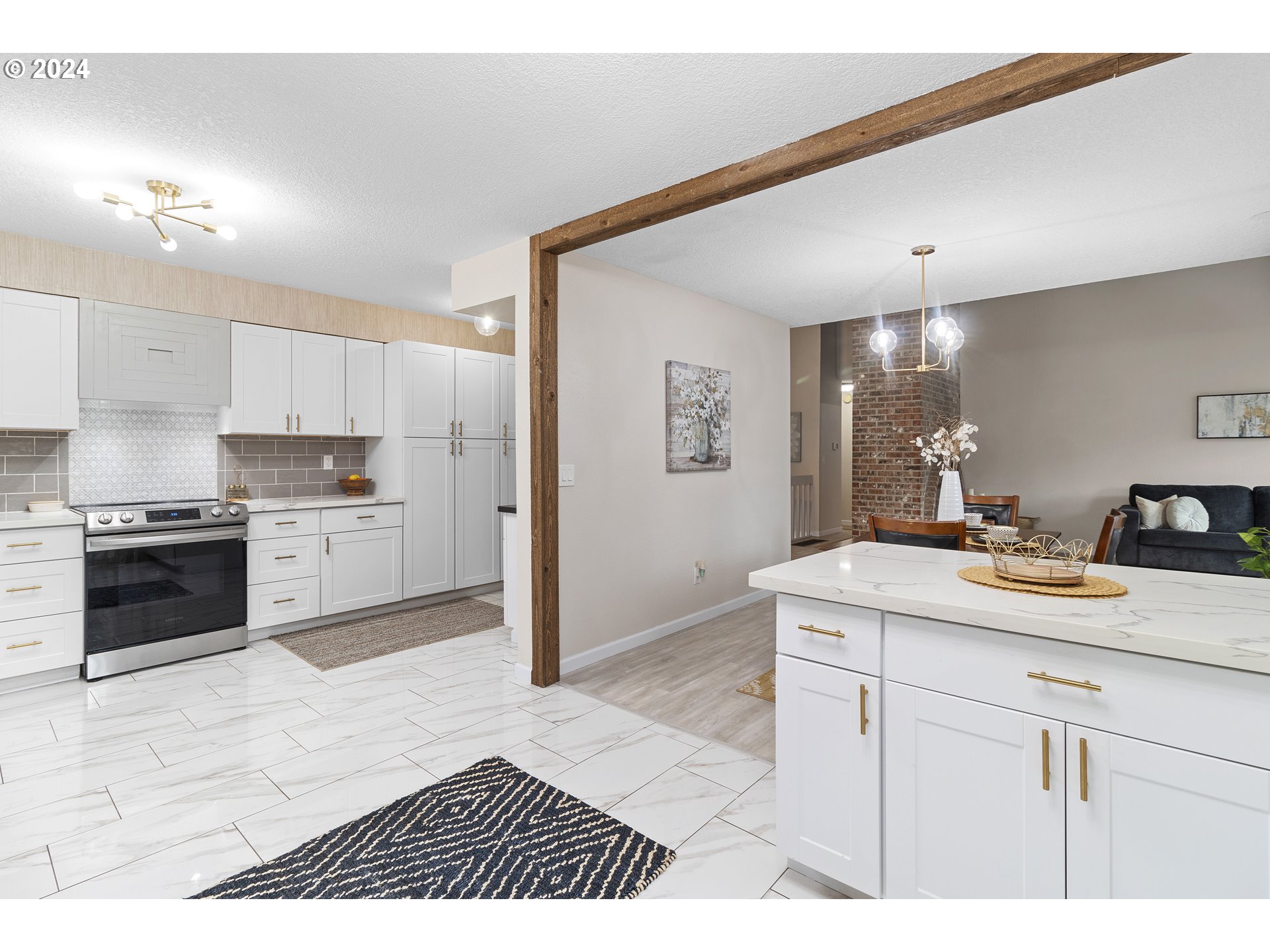 3121 Southwest Orchard Place Gresham, OR 97080 - Photo 21 of 48 a kitchen with a sink cabinets and appliances