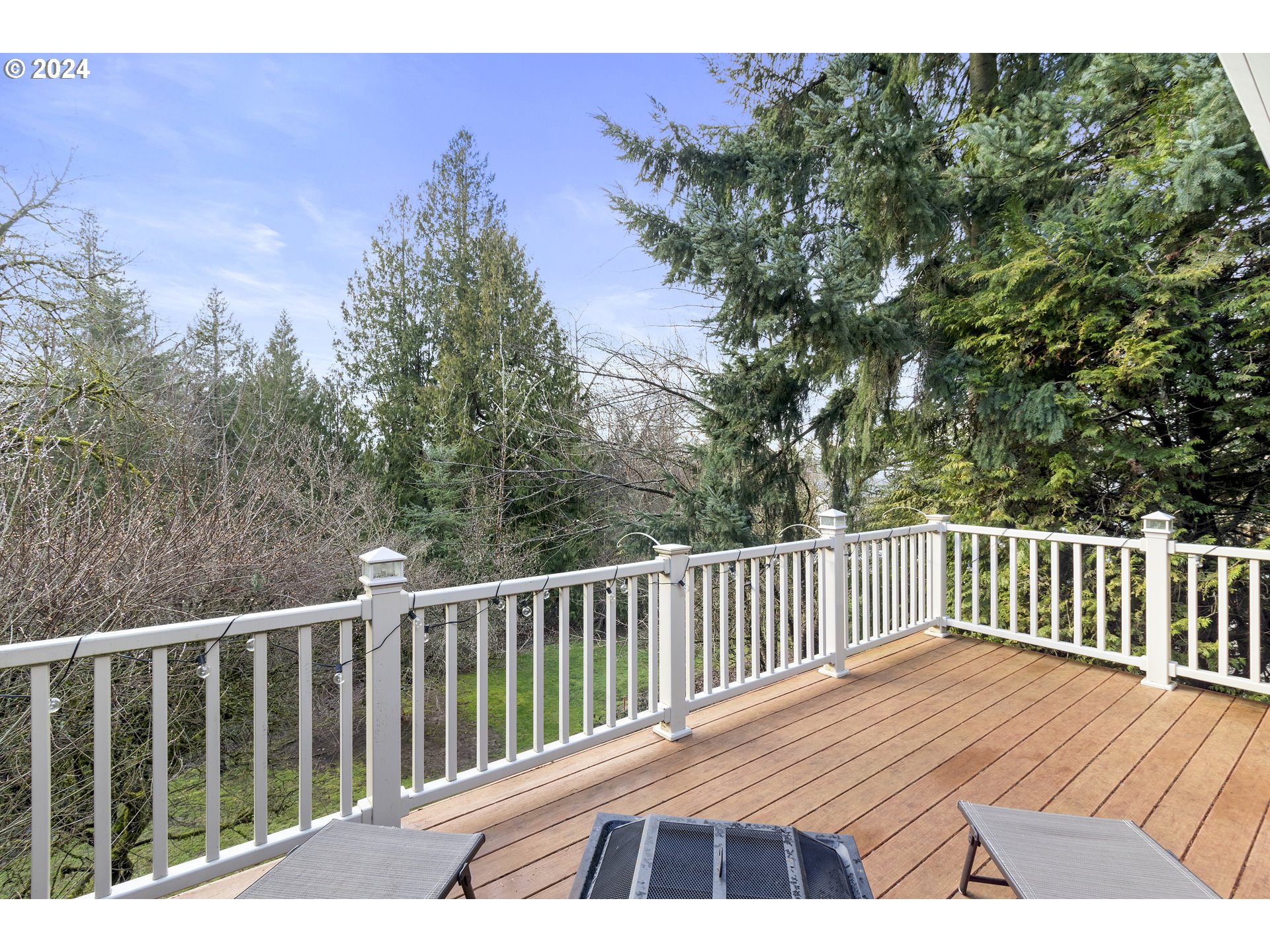 3121 Southwest Orchard Place Gresham, OR 97080 - Photo 22 of 48 a view of balcony with wooden floor and fence