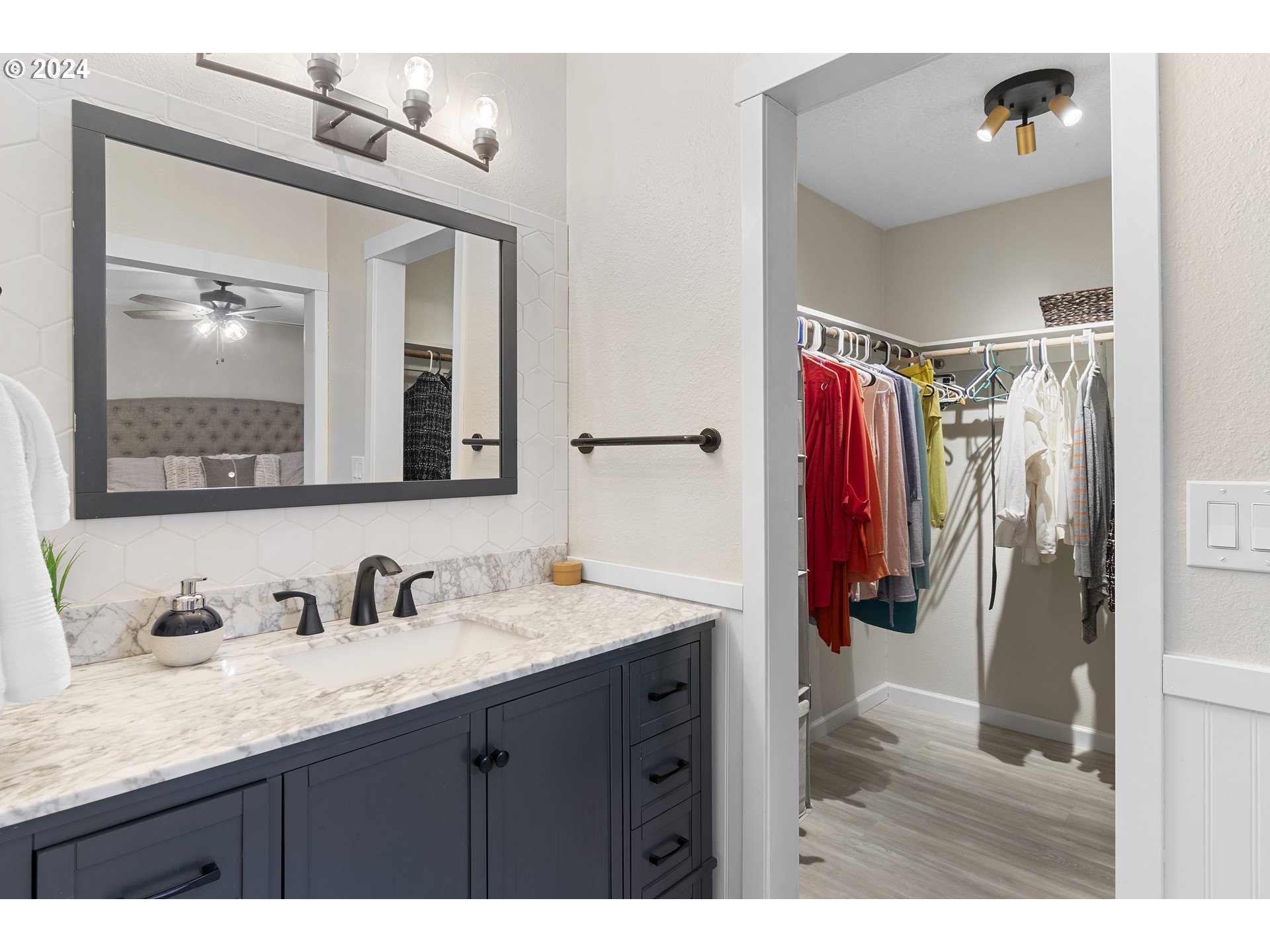 3121 Southwest Orchard Place Gresham, OR 97080 - Photo 26 of 48 a bathroom with a sink vanity and a mirror