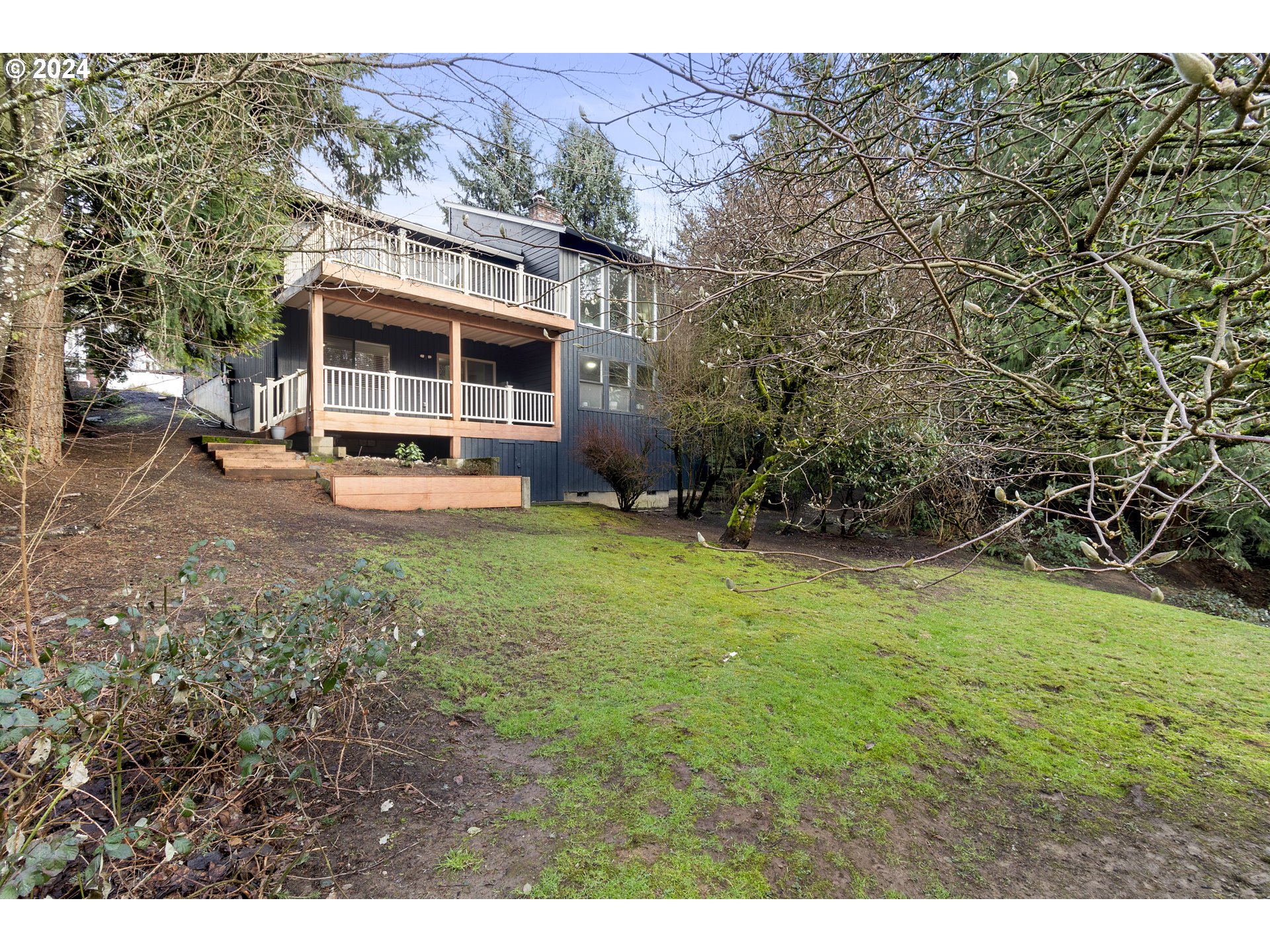 3121 Southwest Orchard Place Gresham, OR 97080 - Photo 43 of 48 a view of an house with backyard space and balcony