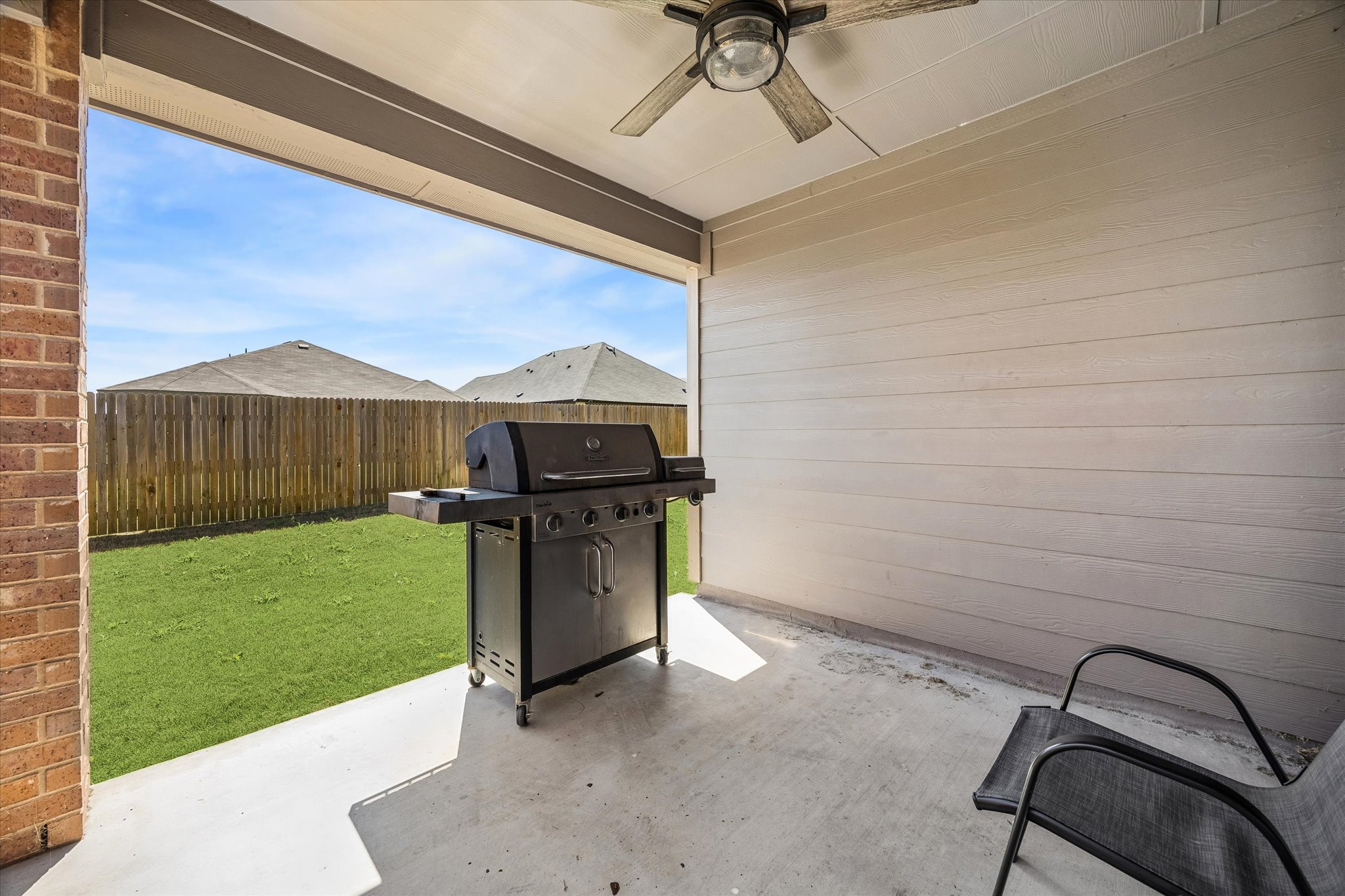 168 Onna Street Taylor, TX 76574 - Photo 28 of 30 a view of a terrace with a garden