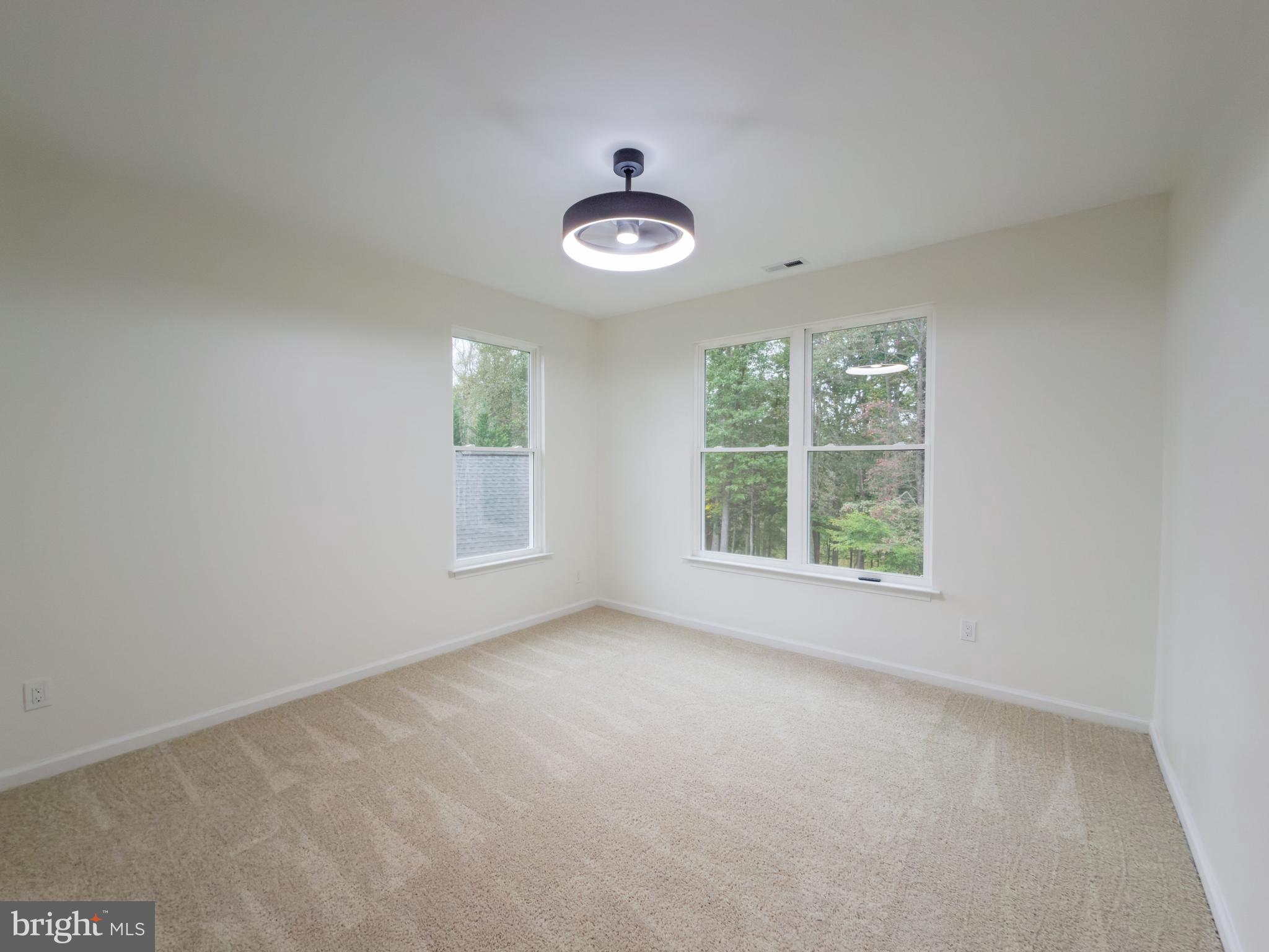 10401 Laurel Ridge Way Fredericksburg, VA 22408 - Photo 17 of 49 an empty room with a window