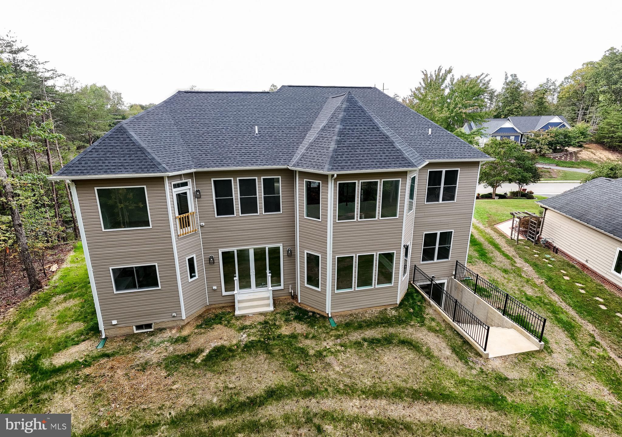 10401 Laurel Ridge Way Fredericksburg, VA 22408 - Photo 41 of 49 a view of a yard in front of a house