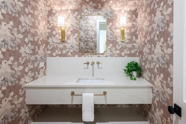 a view of hall with furniture and a potted plant