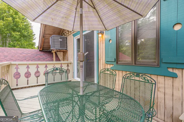 a view of balcony with furniture
