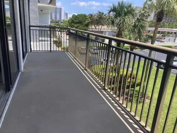 a view of a balcony with city view