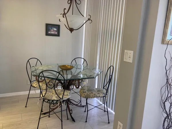 a table and chairs in a room