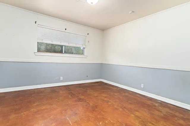 an empty room with a window