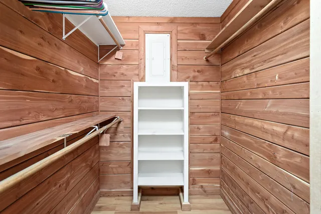 a view of an empty walk in closet